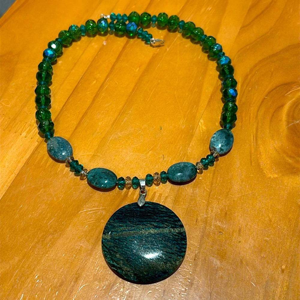 Green gemstone and glass bead necklace.